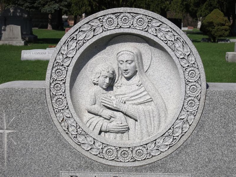 All_Saints_Parish_Cemetery_Chicago_IL_April_22nd_2013_Mary_and_Jesus_carving.jpg